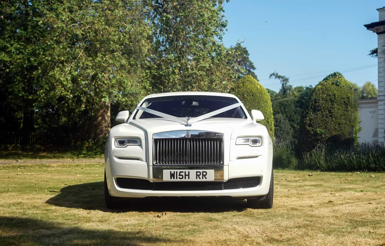 Rolls-Royce Ghost front with wedding ribbons