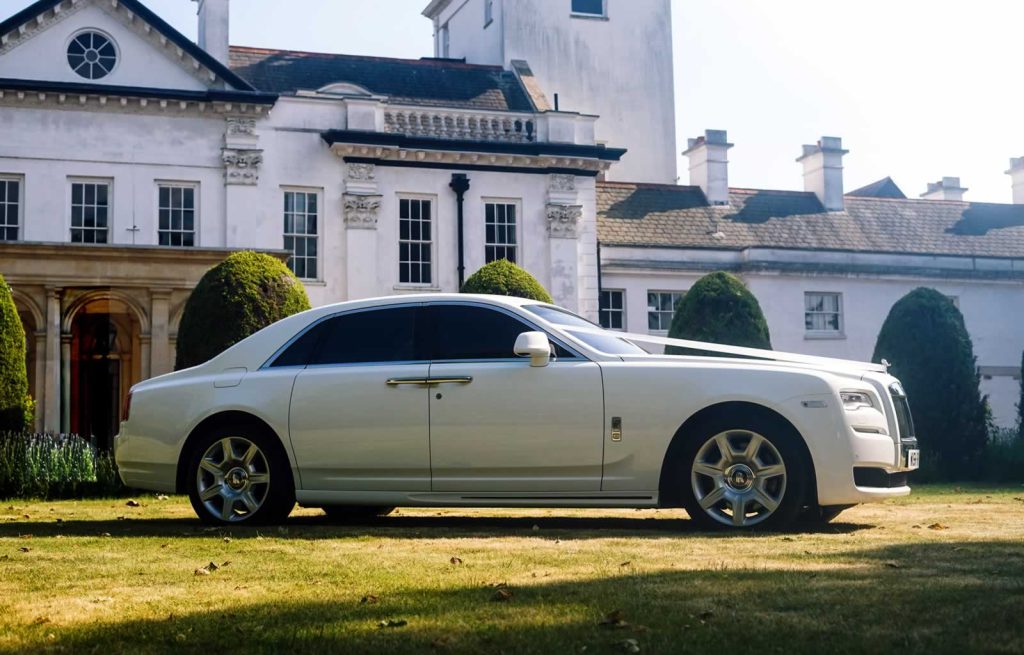 Rolls-Royce Ghost side with wedding ribbons