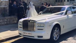 Rolls-Royce Phantom wedding car at the church with Mr & Mrs number plates